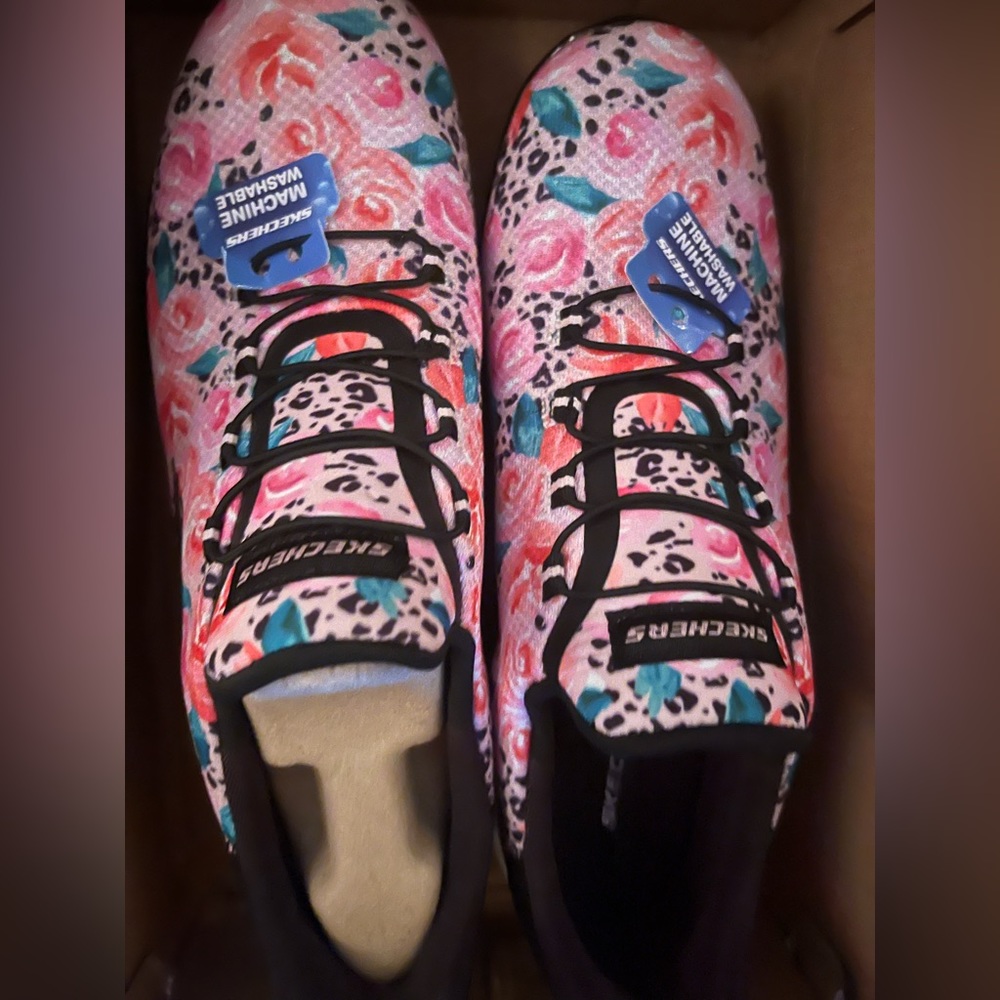 Brand new never worn women’s Skecher slip on sneakers with memory foam, size 8.5